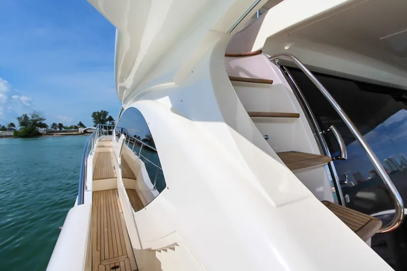 Slide: The Image of Luxury Azimut 70 yacht deck and stairs, 2011 model, with sleek design and ocean view. - 40