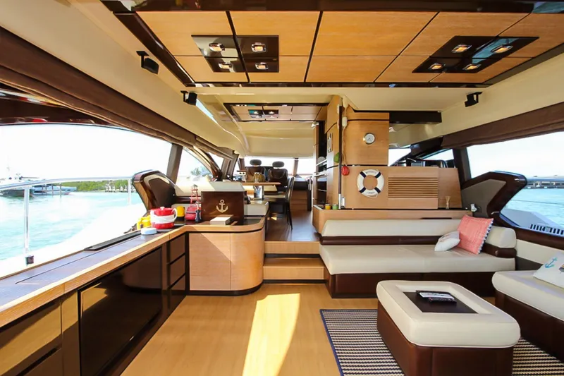 Slide: The Image of Luxurious interior of a 2011 Azimut 70 yacht with modern furnishings and panoramic windows. - 7