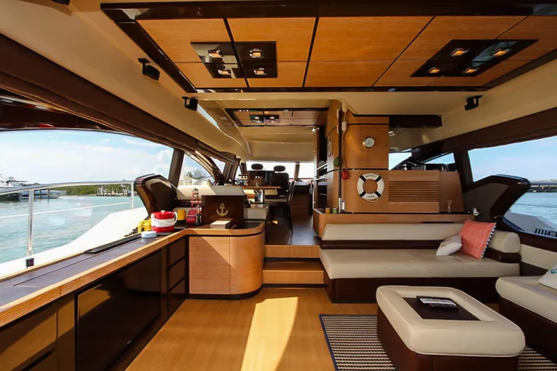 Slide: The Image of Luxurious interior of a 2011 Azimut 70 yacht with modern furnishings and panoramic windows. - 8