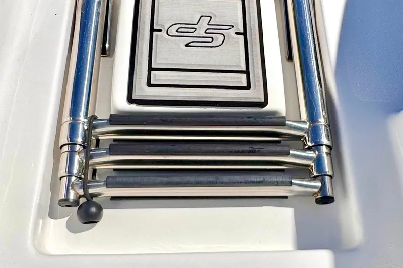 Slide: The Image of 2024 Sea Pro 242 boat ladder with stainless steel design and logo. - 15