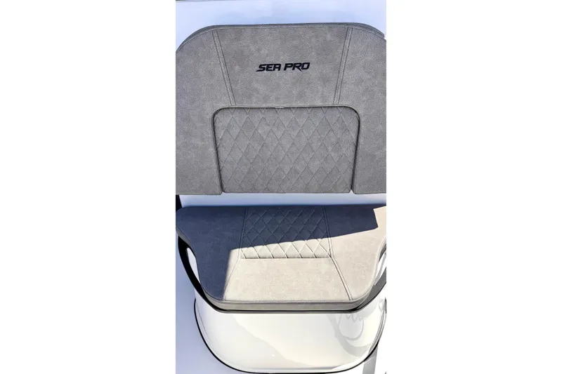 Slide: The Image of 2024 Sea Pro 242 boat seat with gray upholstery and diamond stitching. - 18