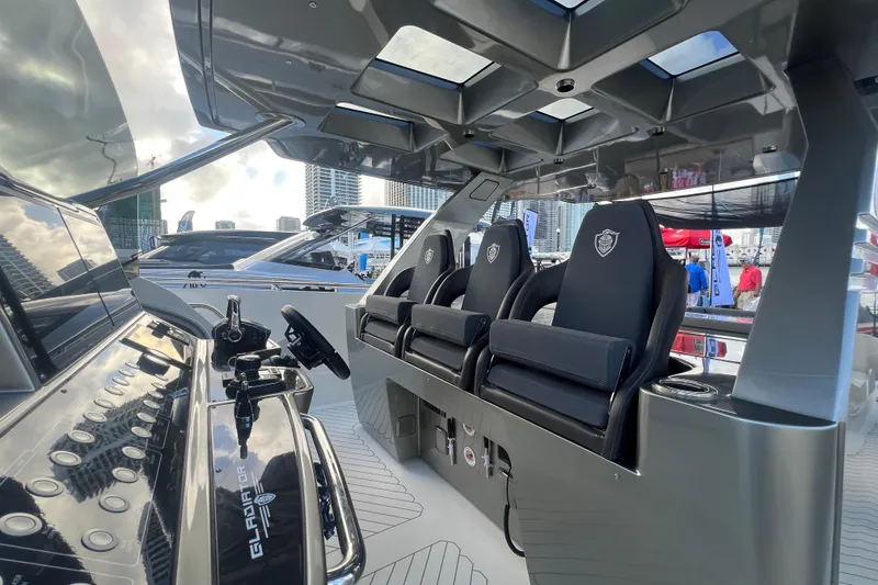 Slide: The Image of Interior of 2023 Canados 493 Gladiator yacht with sleek design and modern seating. - 13