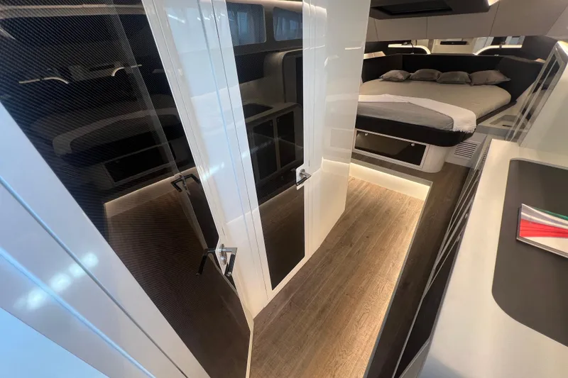 Slide: The Image of Luxurious interior of 2023 Canados 493 Gladiator yacht with modern design and cozy bedroom. - 23