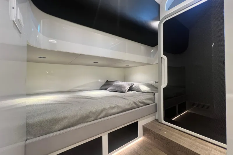 Slide: The Image of Luxurious cabin interior of 2023 Canados 493 Gladiator yacht with modern bedding. - 33