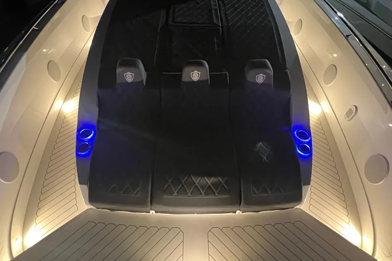 Slide: The Image of 2023 Canados 493 Gladiator interior with illuminated seating and modern design. - 36