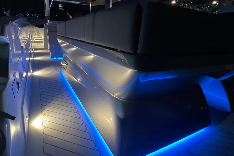 Slide: The Image of 2023 Canados 493 Gladiator boat interior with blue LED lighting. - 38