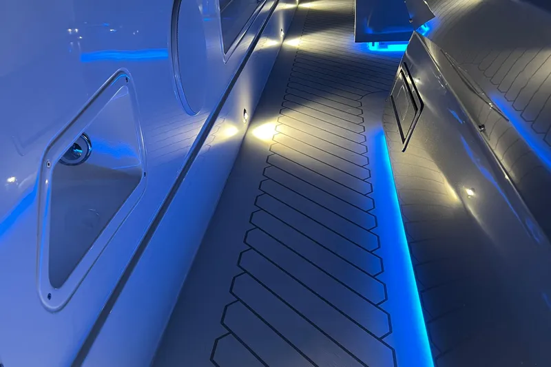 Slide: The Image of 2023 Canados 493 Gladiator yacht interior with sleek blue LED lighting. - 42