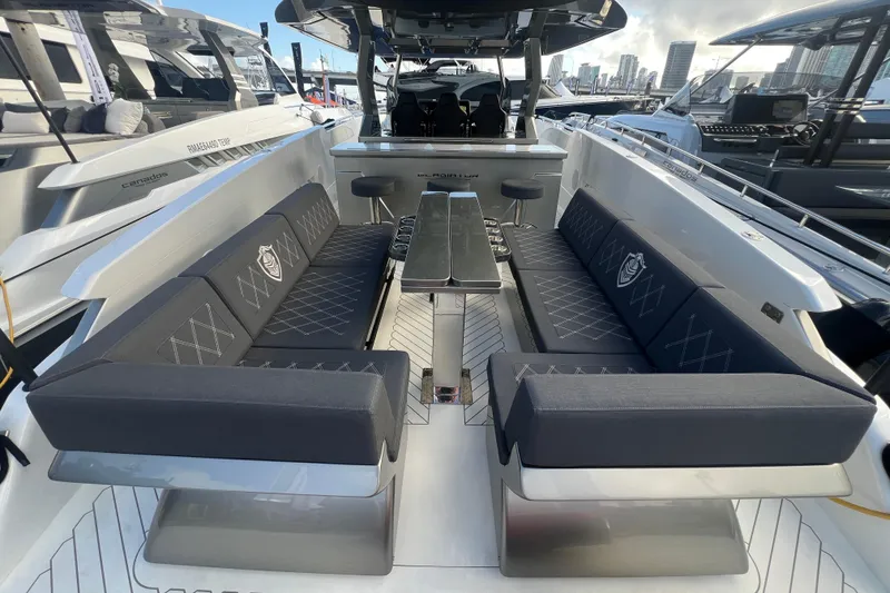 Slide: The Image of 2023 Canados 493 Gladiator luxury yacht interior with sleek seating and modern design. - 5