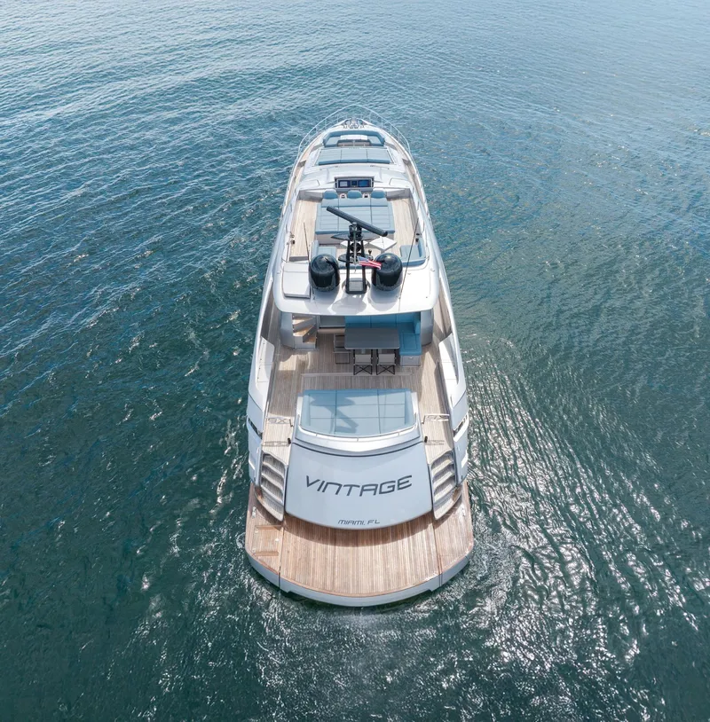 Slide: The Image of Aerial view of 2021 Pershing 9X yacht named "Vintage" on the water. - 10