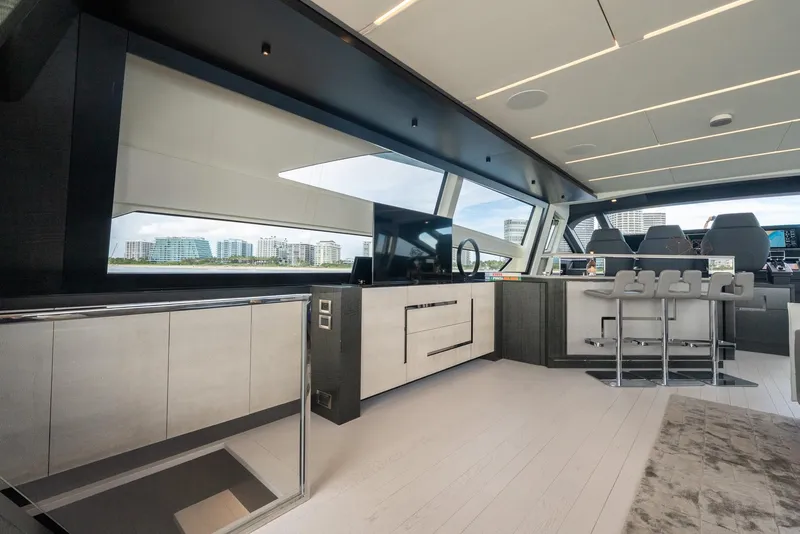 Slide: The Image of Luxurious interior of 2021 Pershing 9X yacht with modern design and panoramic windows. - 18
