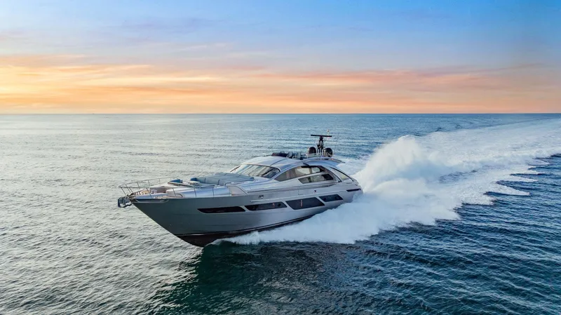 Slide: The Image of Luxury Pershing 9X yacht cruising at sunset, 2021 model. - 4