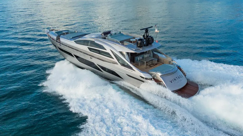Slide: The Image of 2021 Pershing 9X yacht cruising on open water, showcasing sleek design and luxury. - 7