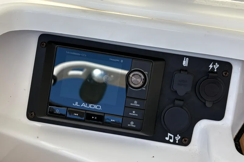 Slide: The Image of 2018 Nautique Super Air Nautique G25 audio control panel with JL Audio system. - 15