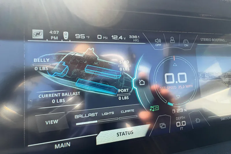Slide: The Image of Dashboard display of a 2018 Nautique Super Air Nautique G25 showing ballast and speed settings. - 23