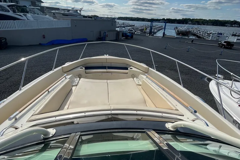Slide: The Image of 2016 Chris-Craft Launch 36 boat with spacious deck, docked at marina. - 16