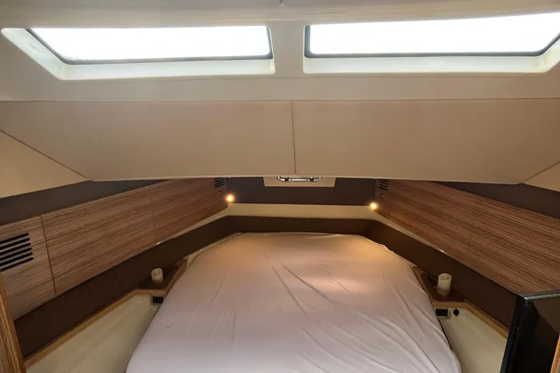 Slide: The Image of Interior cabin of 2016 Chris-Craft Launch 36 with skylights and cozy bed. - 36