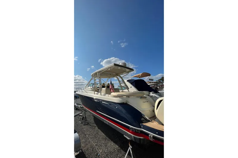 Slide: The Image of 2016 Chris-Craft Launch 36 boat under clear blue sky. - 5