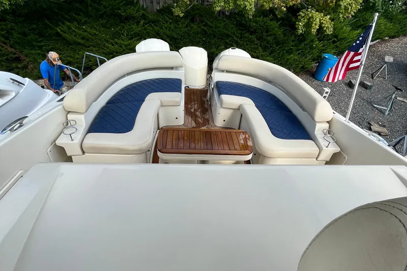 Slide: The Image of 2016 Chris-Craft Launch 36 boat interior with seating and American flag. - 55