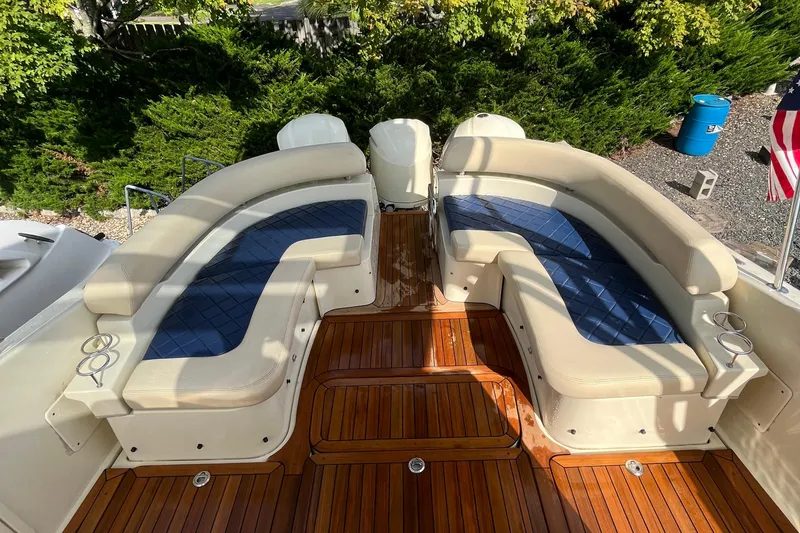 Slide: The Image of 2016 Chris-Craft Launch 36 boat with elegant seating and polished wooden deck. - 63