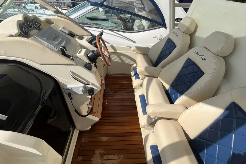 Slide: The Image of 2016 Chris-Craft Launch 36 interior with leather seats and wooden flooring. - 71