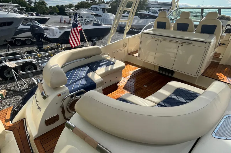 Slide: The Image of 2016 Chris-Craft Launch 36 boat interior with luxurious seating and wooden deck. - 73