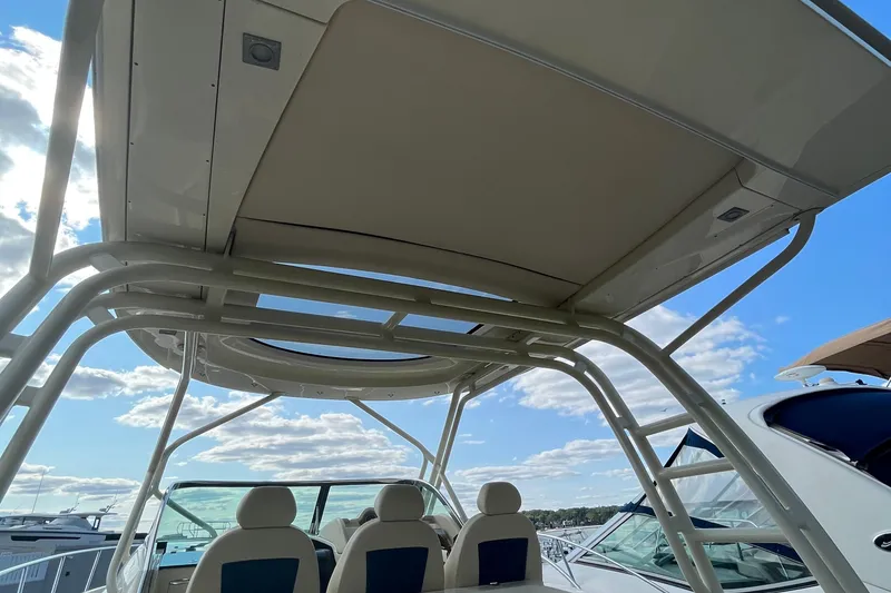 Slide: The Image of 2016 Chris-Craft Launch 36 boat interior with seating and overhead structure. - 9