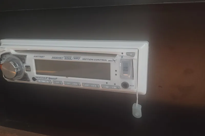 Slide: The Image of 1996 Tiara Yachts 3100 Open stereo system with Bluetooth and USB connectivity. - 23