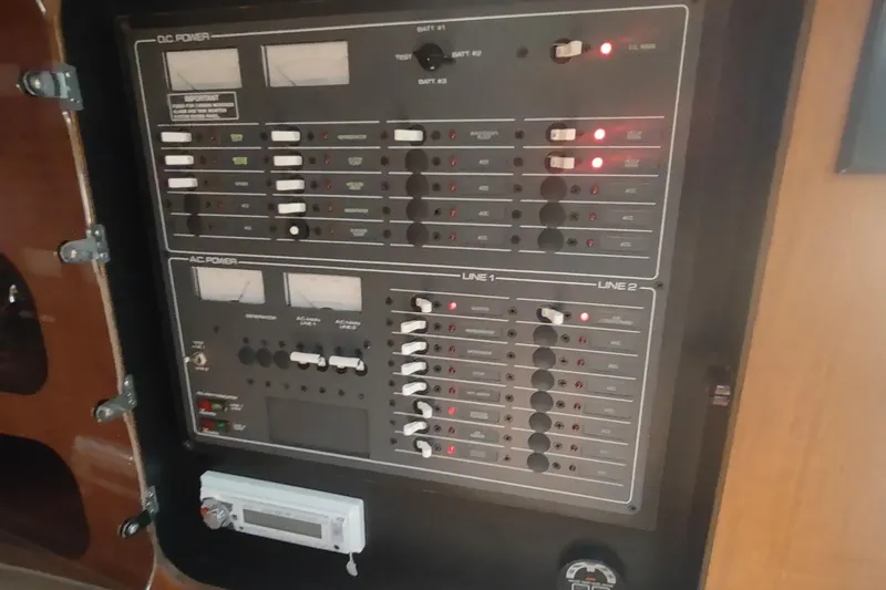 Slide: The Image of Electrical control panel on a 1996 Tiara Yachts 3100 Open boat. - 25