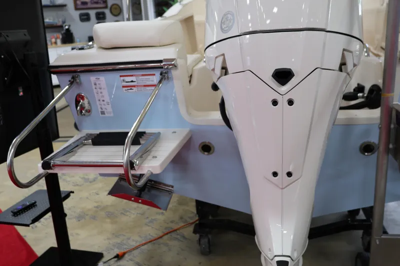 Slide: The Image of 2026 Grady-White Fisherman 180 boat with outboard motor and swim platform. - 3