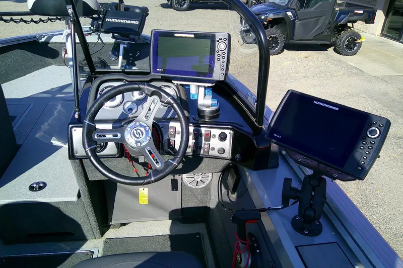 Slide: The Image of 2022 SMOKERCRAFT 182 Pro Angler XL boat dashboard with advanced navigation equipment. - 9