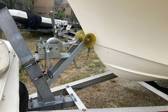 Slide: The Image of 1991 Parker 1801 Center Console boat on trailer, close-up of winch and bow. - 10