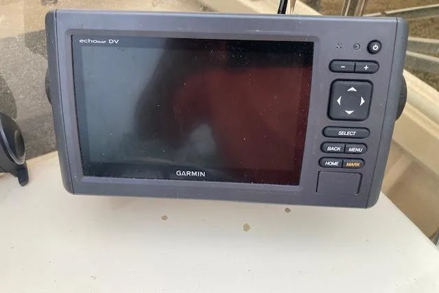 Slide: The Image of Garmin echoMAP DV on 1991 Parker 1801 Center Console boat dashboard. - 6