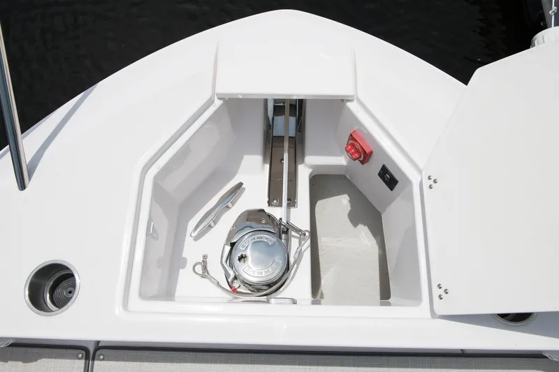 Slide: The Image of Anchor compartment of 2026 Regal 36 Grande Coupe boat, featuring modern design and functionality. - 24