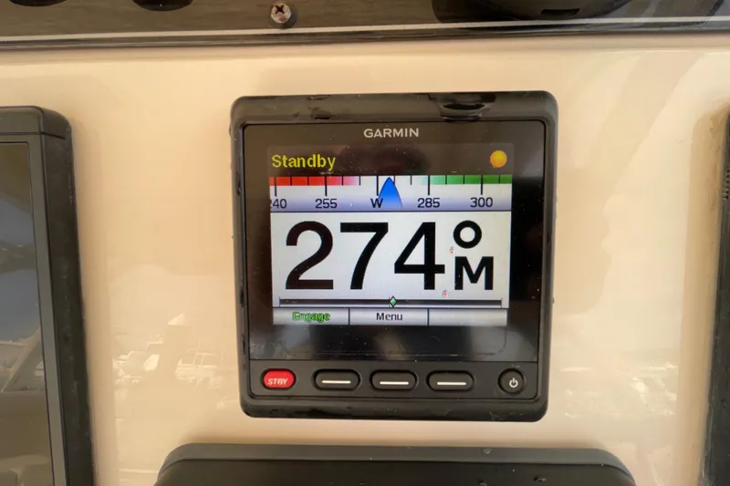 Slide: The Image of Garmin marine display showing 274° heading on a 2016 Grady-White Freedom 335 boat. - 24
