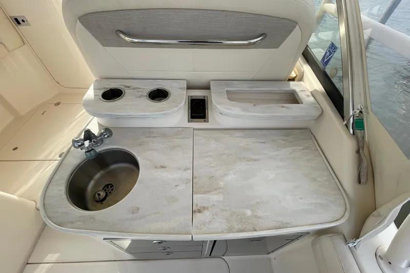 Slide: The Image of 2016 Grady-White Freedom 335 boat interior with sink and countertop. - 33