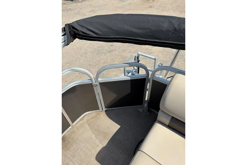 Slide: The Image of 2022 Sun Tracker Party Barge 20 DLX interior with seating and railing details. - 13