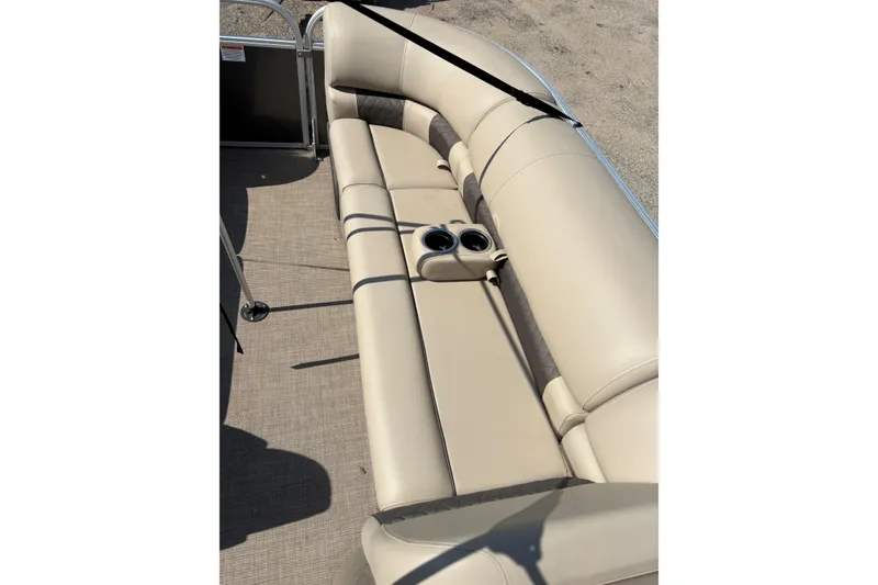 Slide: The Image of 2022 Sun Tracker Party Barge 20 DLX interior seating with cup holders. - 18
