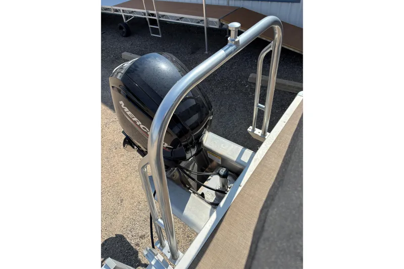 Slide: The Image of 2022 Sun Tracker Party Barge 20 DLX with Mercury outboard motor, rear view. - 6