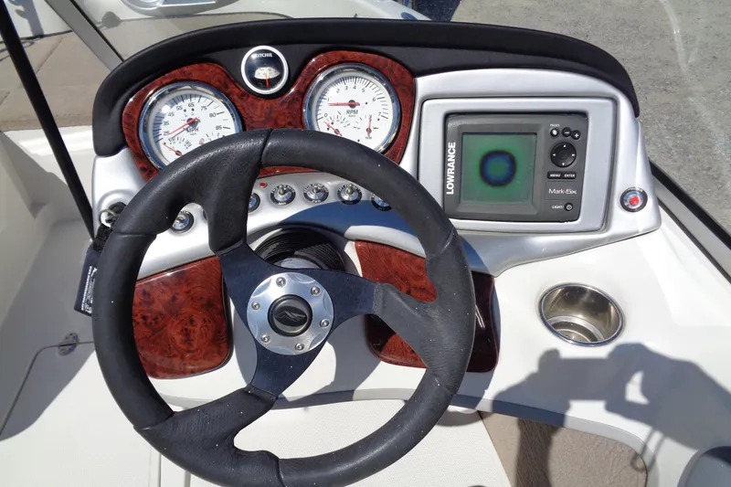 Slide: The Image of Steering console of 2011 Nitro 290 boat with gauges and Lowrance Mark-5x display. - 16