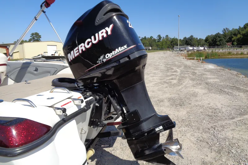 Slide: The Image of 2011 Nitro 290 boat with Mercury OptiMax engine on a sunny day. - 7