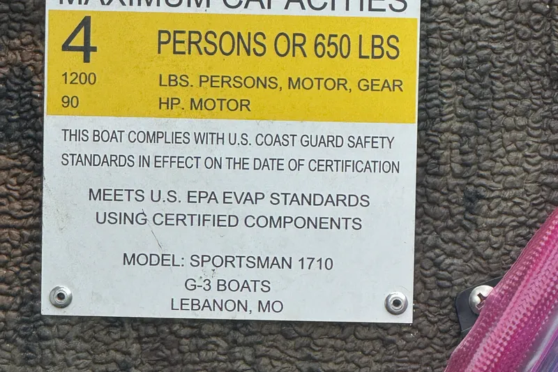 Slide: The Image of Capacity label for 2021 G3 Sportsman 1710 Camo, 4 persons or 650 lbs, USCG compliant. - 11