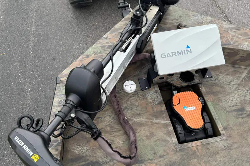 Slide: The Image of 2021 G3 Sportsman 1710 Camo boat with Garmin and Minn Kota equipment. - 6