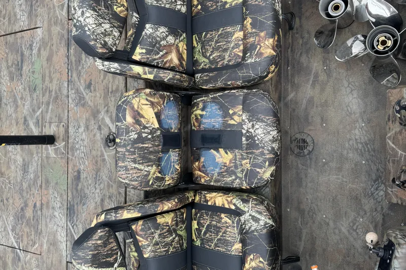 Slide: The Image of 2021 G3 Sportsman 1710 Camo boat seats with camouflage pattern and propellers. - 7