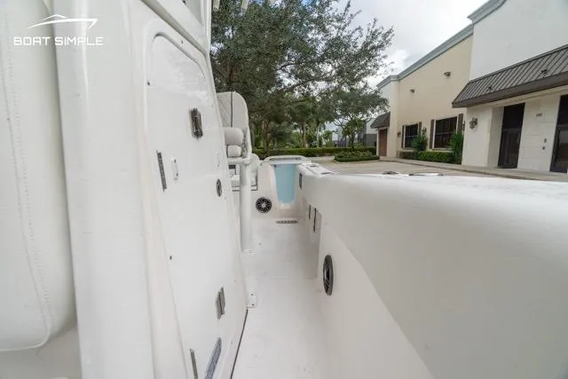 Slide: The Image of 2026 Sea Fox 228 Commander boat deck, white interior, outdoor setting. - 22