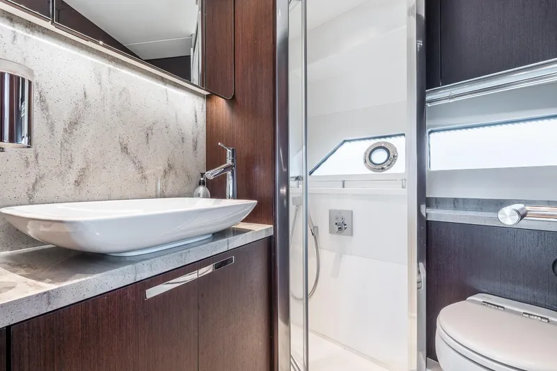 Slide: The Image of Luxurious bathroom interior of 2021 Sunseeker 60 Evo yacht with modern fixtures. - 23