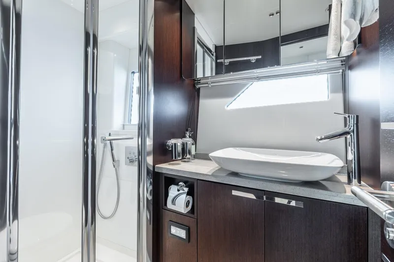 Slide: The Image of Luxurious bathroom in 2021 Sunseeker 60 Evo yacht with modern fixtures and elegant design. - 27