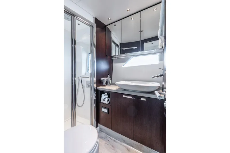 Slide: The Image of Luxurious bathroom in 2021 Sunseeker 60 Evo yacht with modern fixtures. - 28
