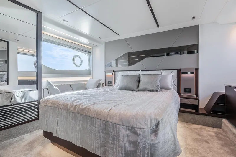 Slide: The Image of Luxurious bedroom interior of 2021 Sunseeker 60 Evo yacht with modern design and large window. - 29