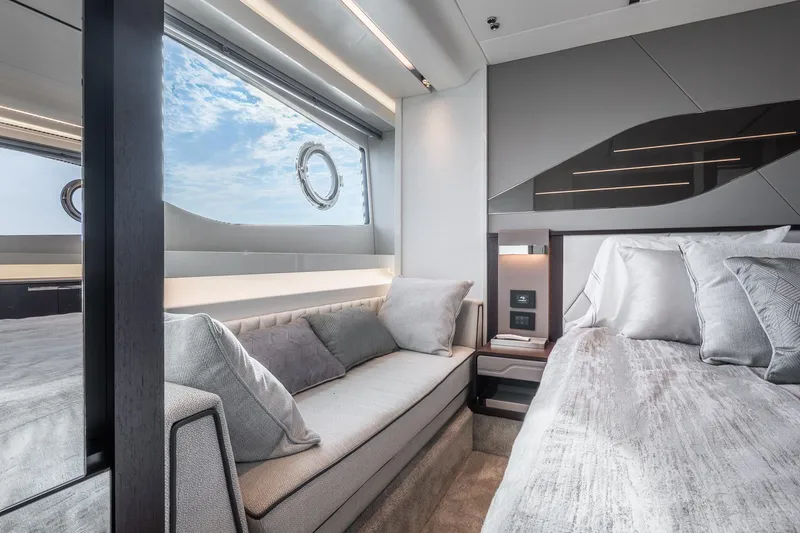 Slide: The Image of Luxurious interior of 2021 Sunseeker 60 Evo yacht with elegant bedding and seating. - 30