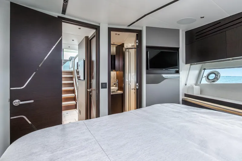 Slide: The Image of Luxurious interior of 2021 Sunseeker 60 Evo yacht with modern bedroom and ocean view. - 31